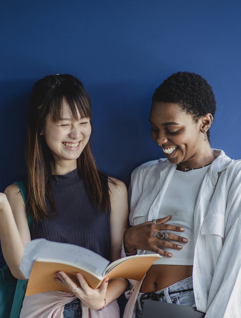 Two Young Women With Happy Faces